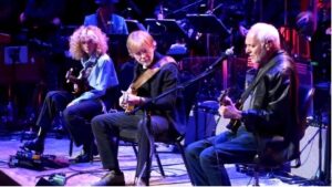 Peter Frampton, Trey Anastasio, and Grace Bowers Cover Harrison